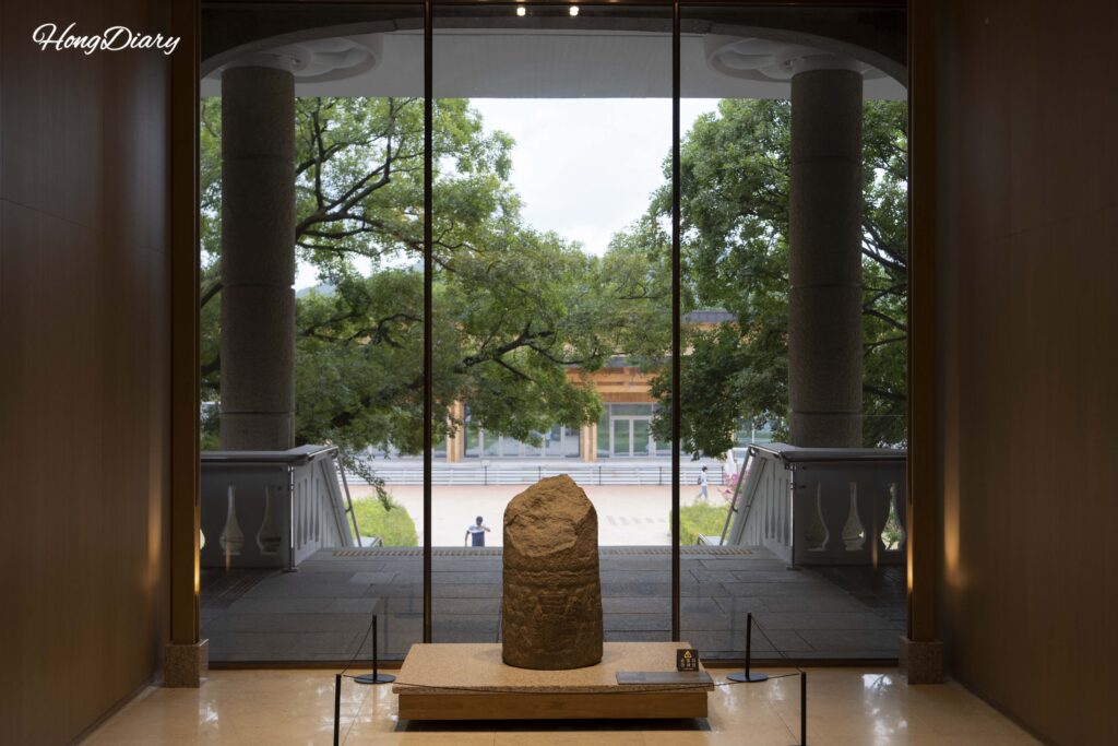 Interior corridor of the Silla History Gallery at Gyeongju National Museum with display cases and ambient lighting