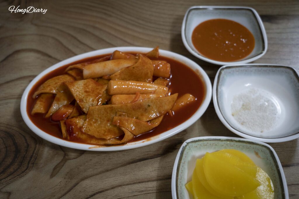 Plate of tteokbokki (spicy Korean rice cakes in red sauce) ordered at Seongdong Market Gyeongju