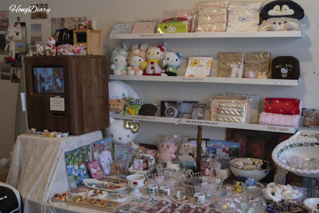 Small handmade souvenirs and scented goods on display at ADoR gift shop in Gwangalli