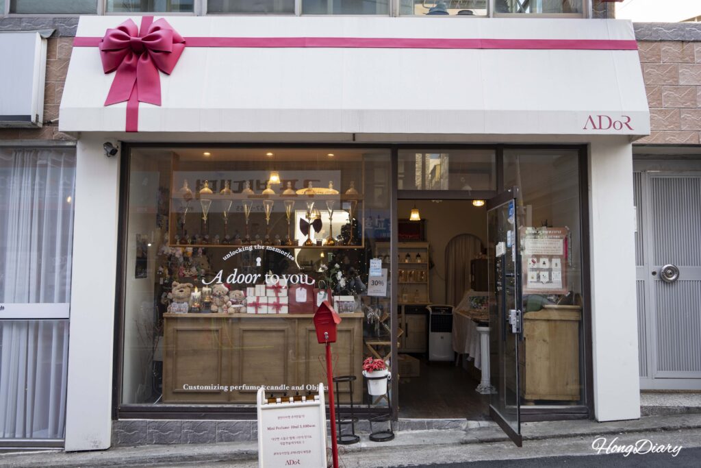 ADoR perfume workshop storefront on a quiet Gwangalli backstreet in Suyeong-gu, Busan