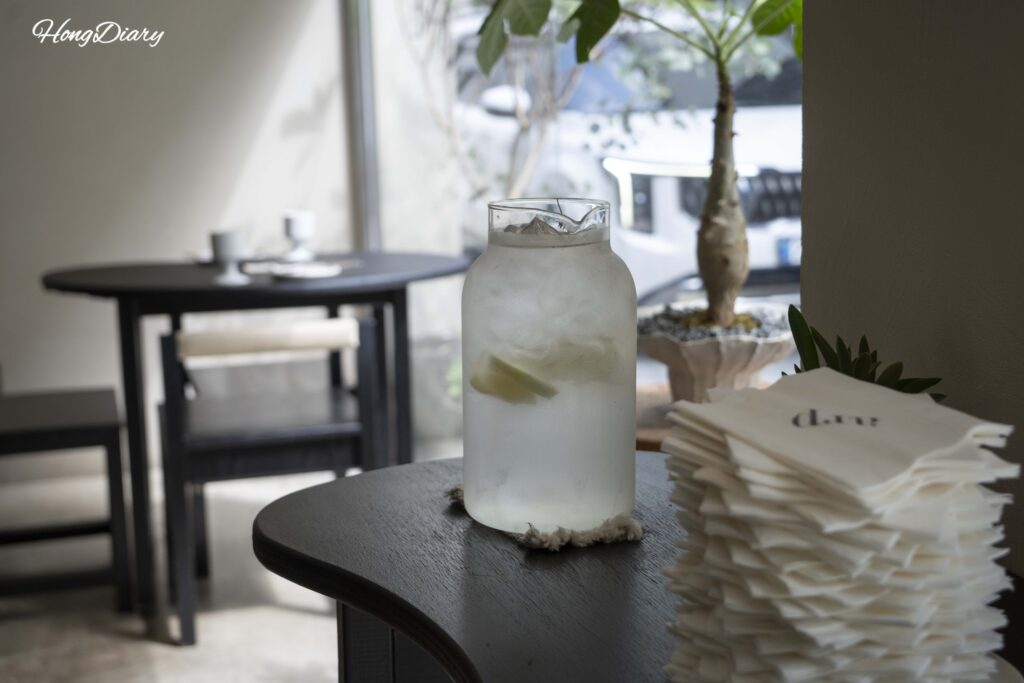 Close-up of seating area inside ARP vegan restaurant in Busan showing clean modern interior