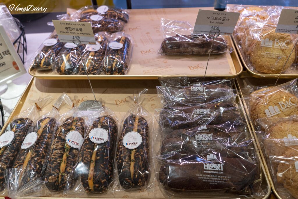 Mentaiko mayo bread and chocolate bread on display at B&C Bakery in Busan Station