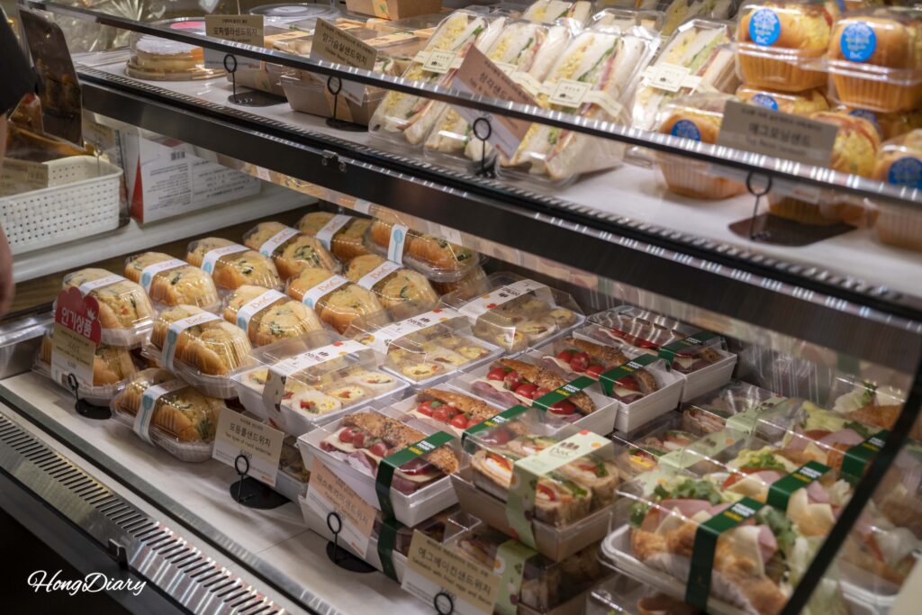 Assorted sandwiches including chicken breast and pastrami at B&C Bakery Busan Station