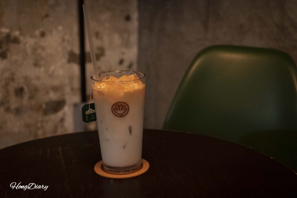 Iced milk tea served at Brown Hands Baekje cafe in Busan, priced at 8300 Korean won