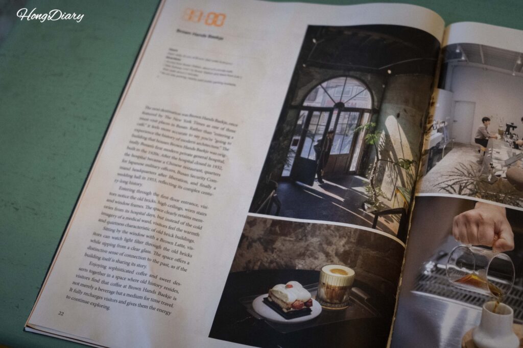 Magazine article about Brown Hands Baekje cafe displayed inside the cafe in Busan