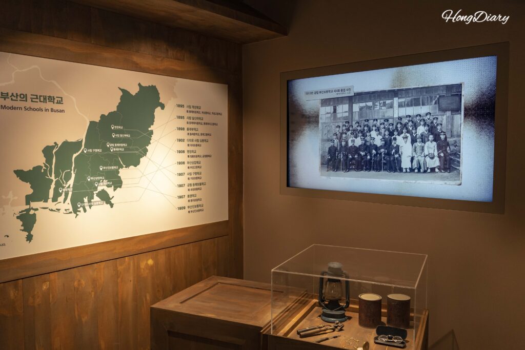 Maps and video displays explaining the history of modern schools in Busan at the Busan Education History Museum