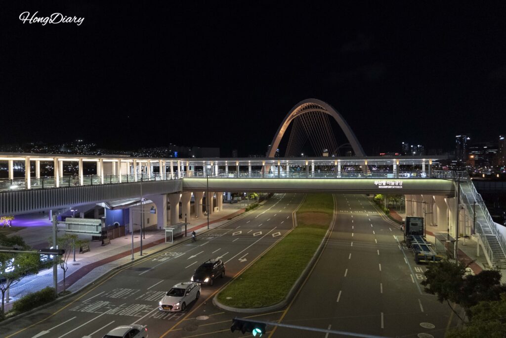 Elevated pedestrian skybridge connecting Busan Station to North Port Waterfront Park and the International Passenger Terminal