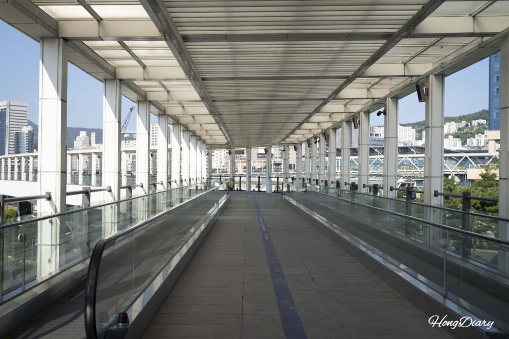 Moving walkway on the covered skywalk connecting Busan Station to Busan Port International Passenger Terminal