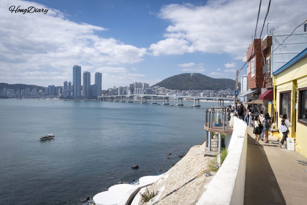 Ocean panorama from Huinnyeoul Culture Village in Yeongdo, Busan with Songdo skyline in the distance