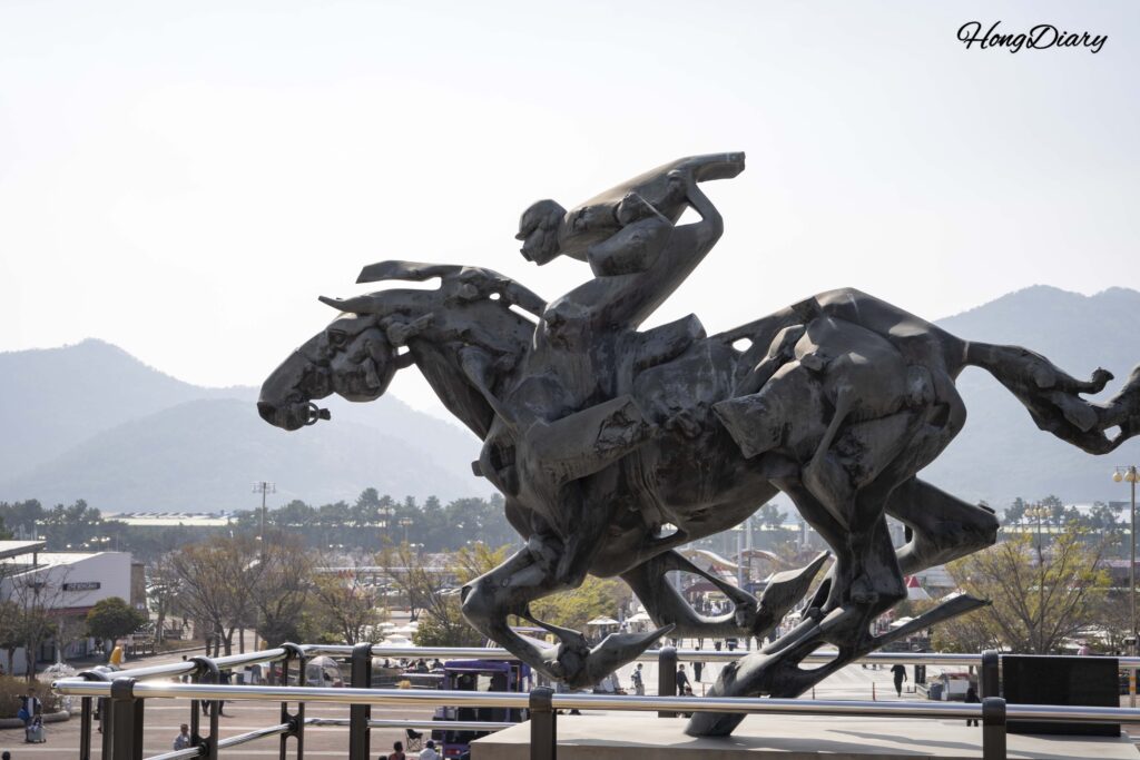 Bronze equestrian statue at the entrance of Let's Run Park Busan-Gyeongnam