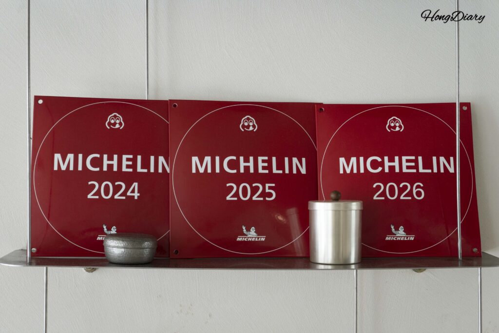 Michelin Bib Gourmand certificate displayed at ARP vegan restaurant in Busan