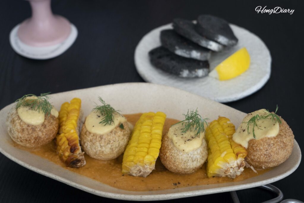 Mushroom crumble served alongside grilled baby cabbage at ARP vegan restaurant in Busan