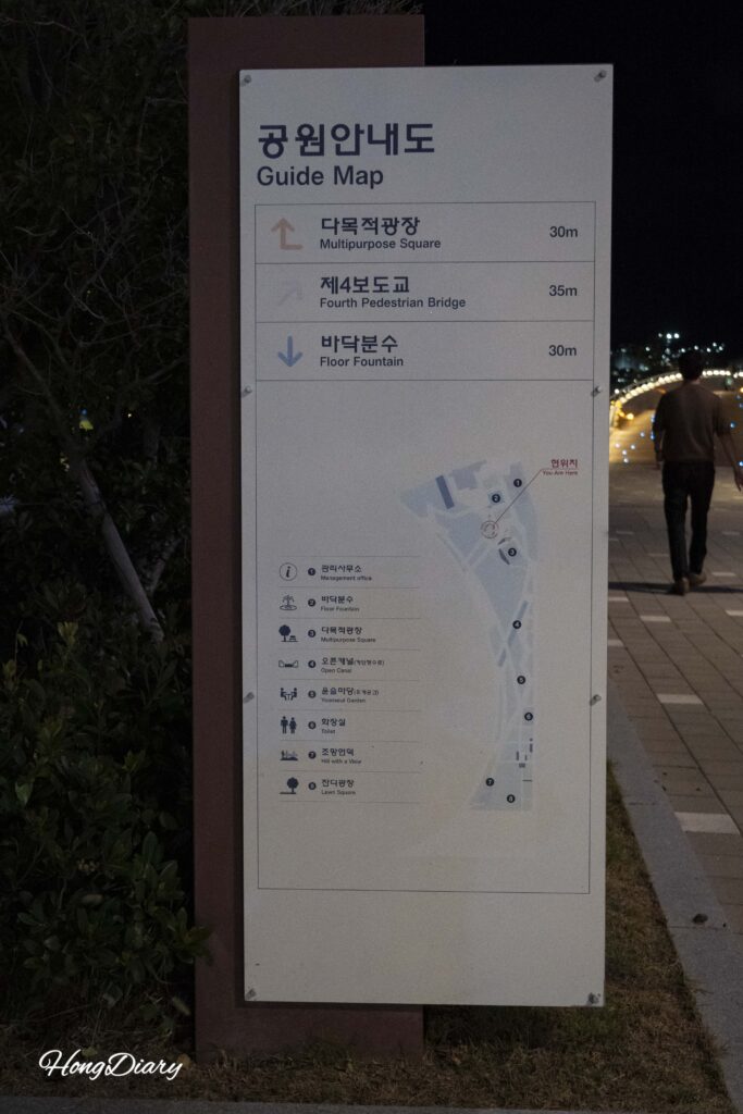 Information and map board at the entrance of North Port Waterfront Park Busan showing park layout and facilities