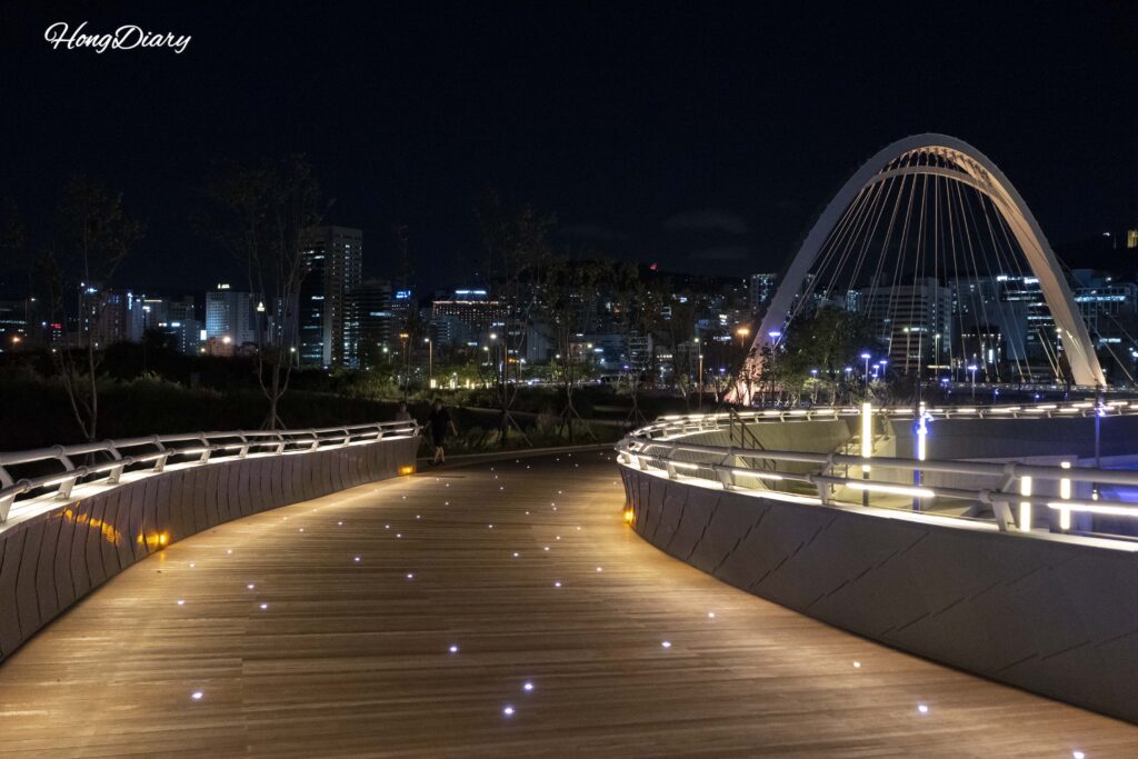 Star-like LED floor lights embedded in the Observation Deck at North Port Waterfront Park Busan at night