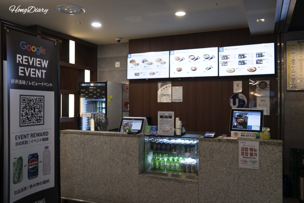 Google review QR code promotion and order receipt at Plating food court in Gimhae Airport