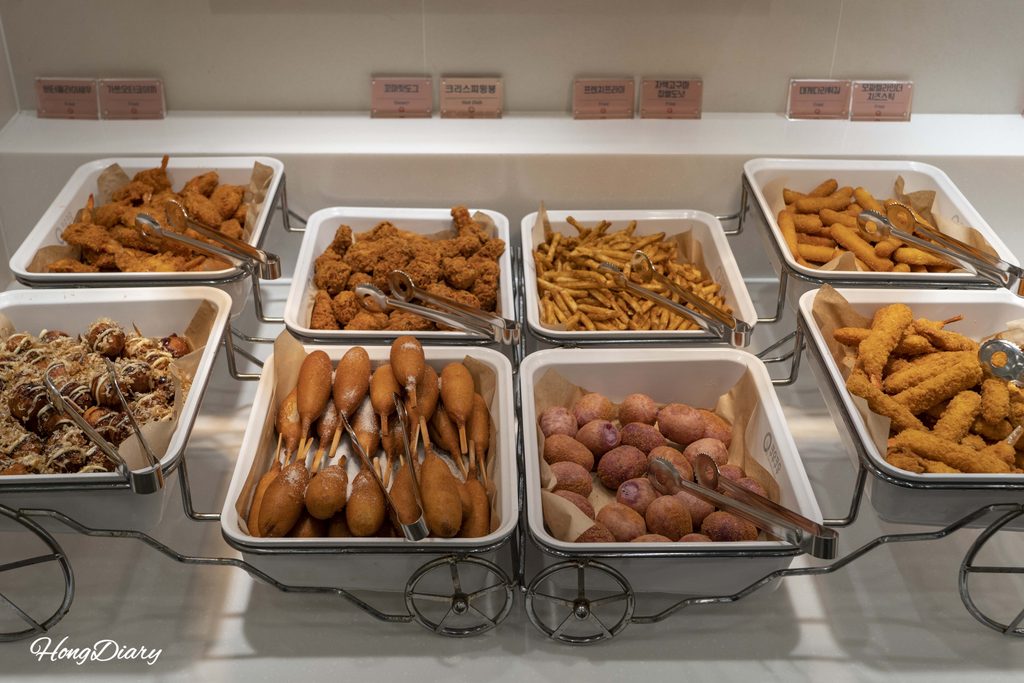 Fried chicken, corn dogs, French fries, and tempura at QooQoo buffet