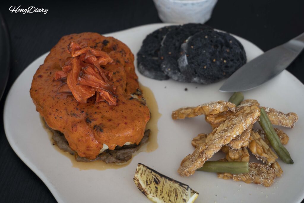 Roasted cauliflower in peri-peri sauce with tempeh fries served at ARP vegan restaurant in Yeongdo, Busan