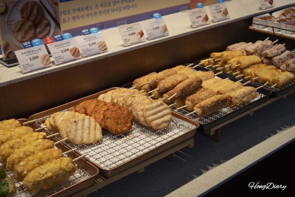 Wide display of various fish cake snacks priced between ₩3,000 and ₩4,000 at Samjin Yeongdo