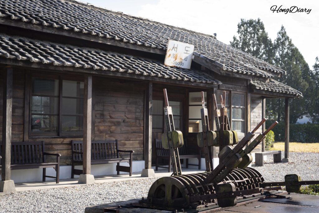 Side view of the 1932 wooden Seodo Station building in Namwon, showing its full timber structure