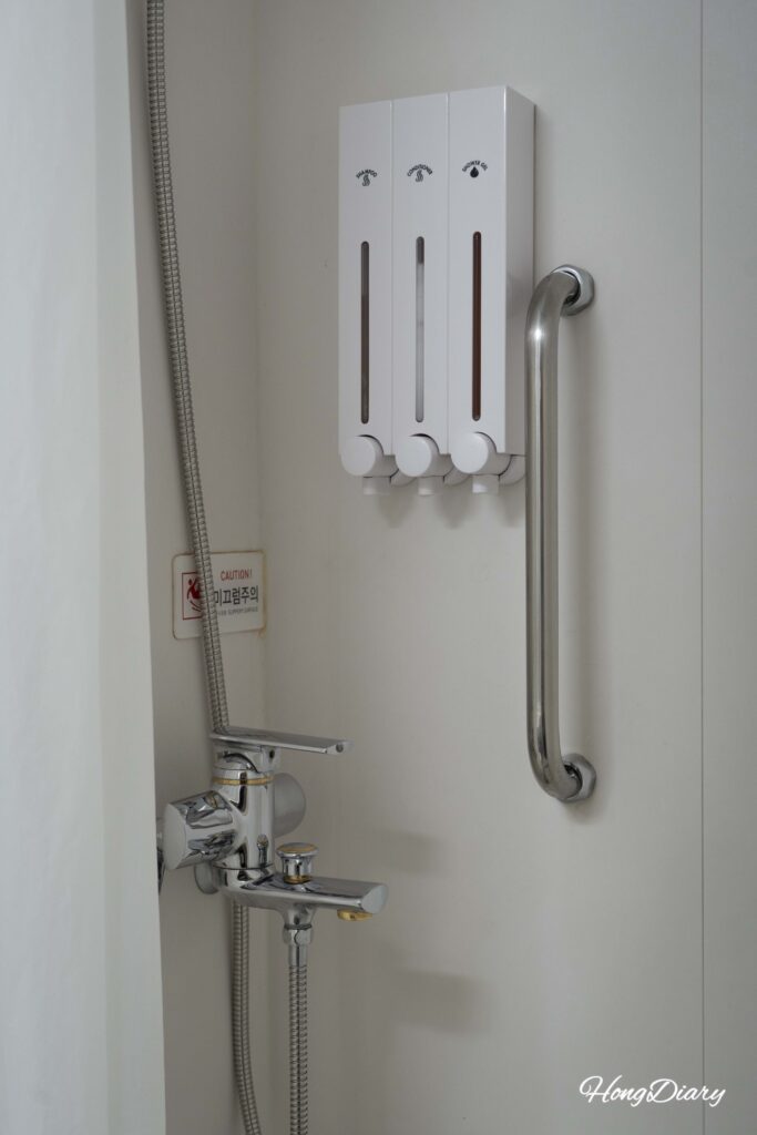 Shower area inside the private bathroom of the Seonghee ferry tatami cabin