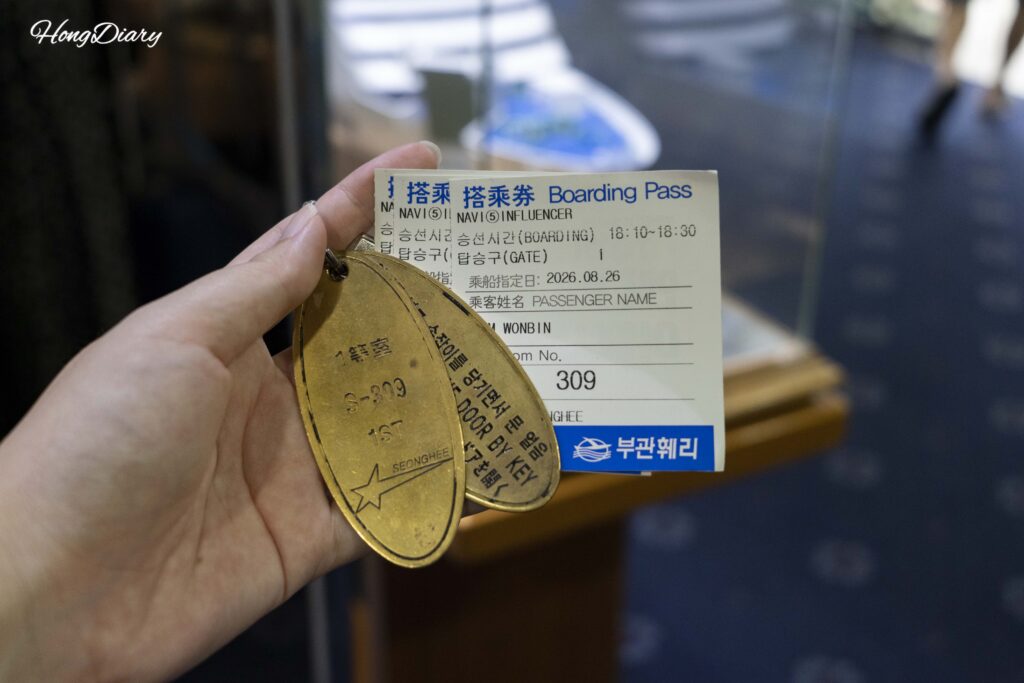 Seonghee ferry boarding pass and cabin room key