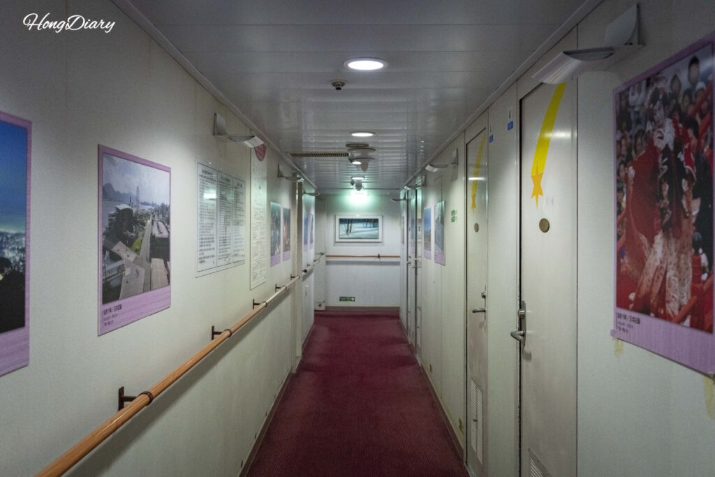 Interior corridor of the Seonghee ferry showing cabin doors and hallway