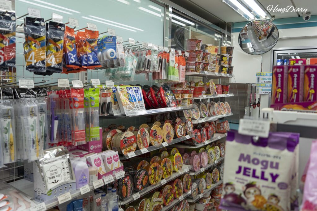 Inside the GS25 convenience store on the Seonghee ferry showing snacks and instant noodles