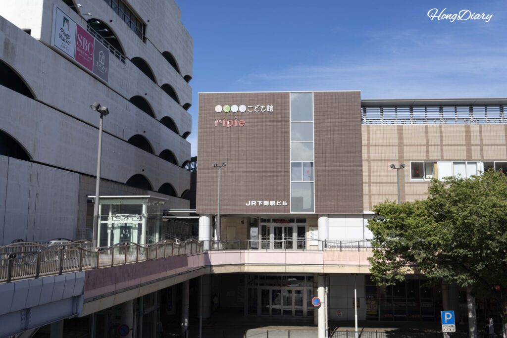 View of Sea Mall, Ripie building, and JR Shimonoseki Station entrance from the elevated walkway
