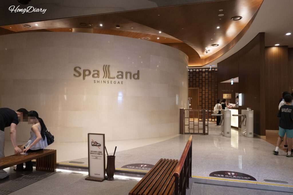 Spa Land Busan lobby and check-in counter where visitors purchase tickets and receive wristbands