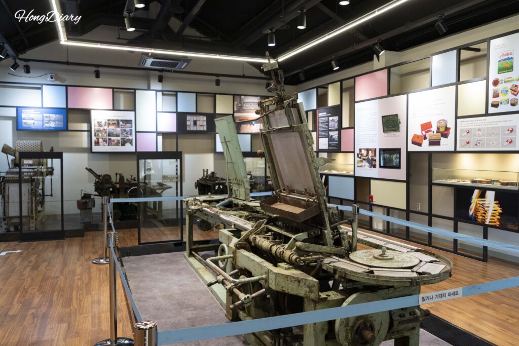 Vintage matchstick manufacturing machines displayed at the Match Museum in Jinyeong, Gimhae