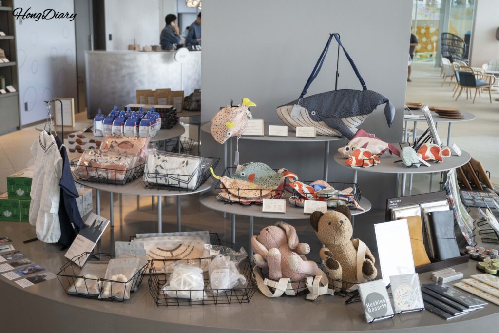 Regional specialty goods and sea creature-themed merchandise displayed at the lobby shop in RISONARE Shimonoseki
